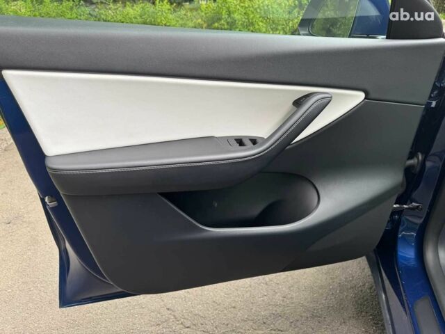 Тесла Model Y 2021 в Киеве на Automoto.ua Синий Тесла Model Y, объемом двигателя 0 л и пробегом 86 тыс. км за 19390 $, фото 12 на Automoto.ua