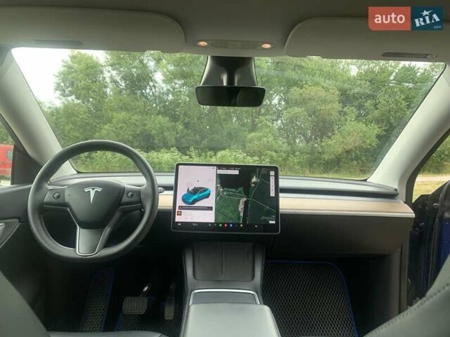 Синий Тесла Model Y, объемом двигателя 0 л и пробегом 75 тыс. км за 22900 $, фото 11 на Automoto.ua