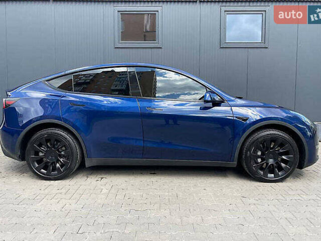Синий Тесла Model Y, объемом двигателя 0 л и пробегом 60 тыс. км за 20000 $, фото 3 на Automoto.ua