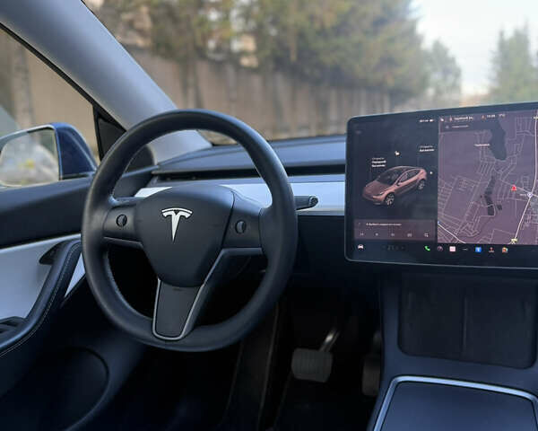 Синий Тесла Model Y, объемом двигателя 0 л и пробегом 97 тыс. км за 26500 $, фото 28 на Automoto.ua
