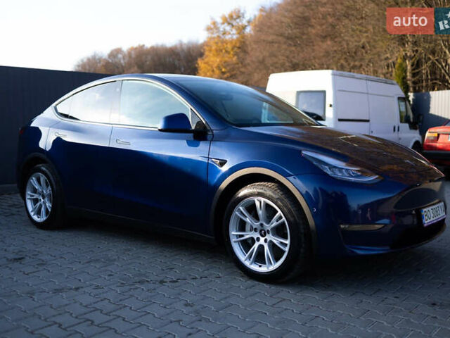 Синий Тесла Model Y, объемом двигателя 0 л и пробегом 42 тыс. км за 27000 $, фото 1 на Automoto.ua