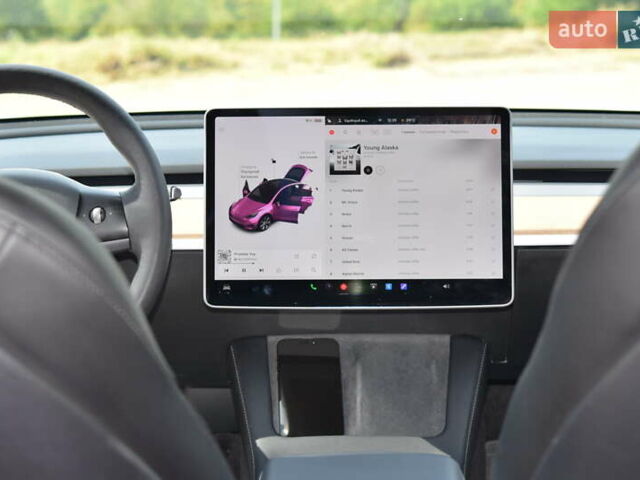 Синий Тесла Model Y, объемом двигателя 0 л и пробегом 81 тыс. км за 25499 $, фото 31 на Automoto.ua