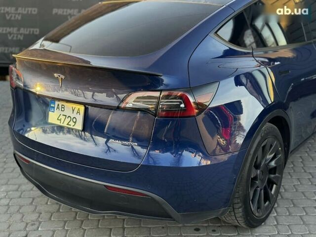Синий Тесла Model Y, объемом двигателя 0 л и пробегом 83 тыс. км за 28000 $, фото 24 на Automoto.ua