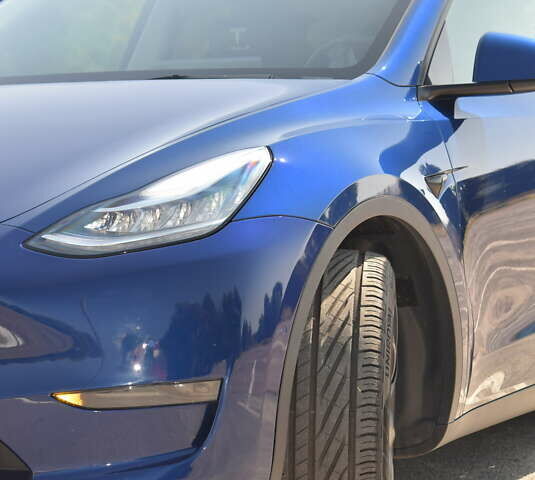 Синий Тесла Model Y, объемом двигателя 0 л и пробегом 81 тыс. км за 25499 $, фото 11 на Automoto.ua