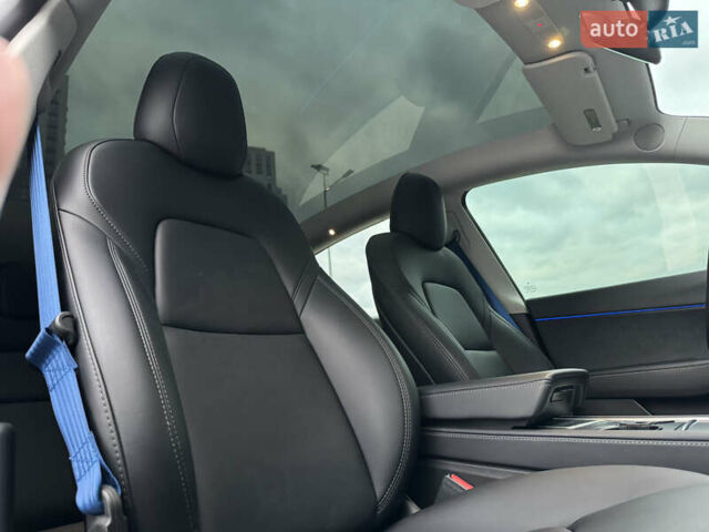 Синий Тесла Model Y, объемом двигателя 0 л и пробегом 88 тыс. км за 31990 $, фото 39 на Automoto.ua