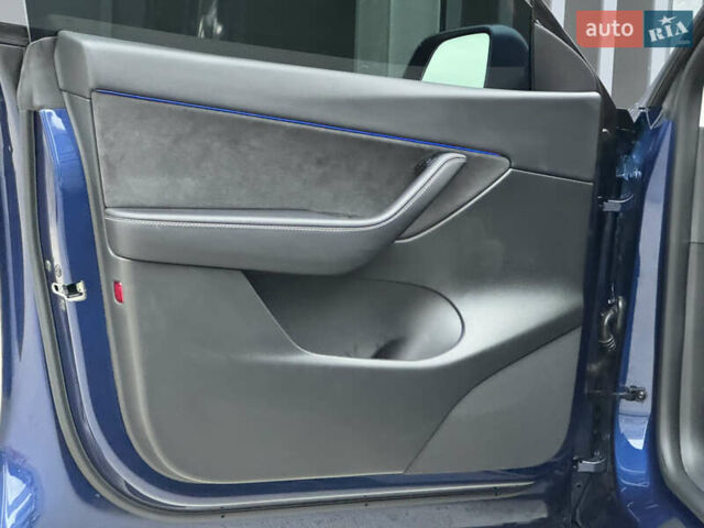 Синий Тесла Model Y, объемом двигателя 0 л и пробегом 88 тыс. км за 31990 $, фото 25 на Automoto.ua