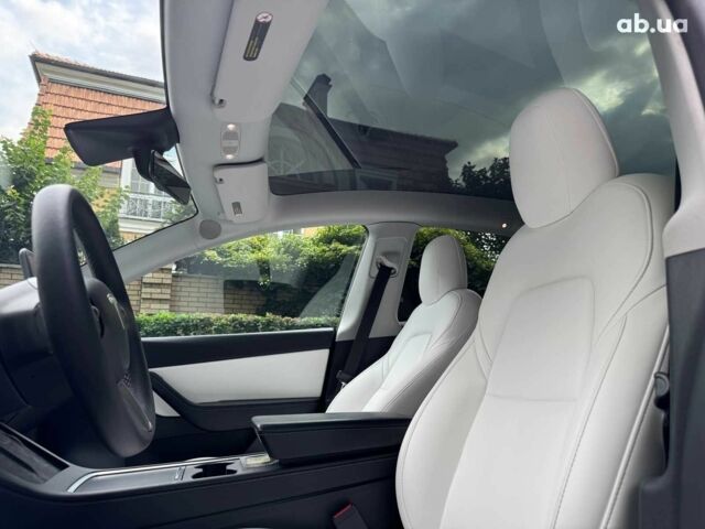 Тесла Model Y 2021 в Киеве на Automoto.ua Синий Тесла Model Y, объемом двигателя 0 л и пробегом 86 тыс. км за 19390 $, фото 17 на Automoto.ua