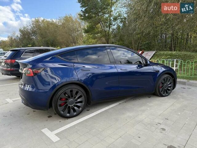 Синій Тесла Model Y, об'ємом двигуна 0 л та пробігом 88 тис. км за 22999 $, фото 12 на Automoto.ua