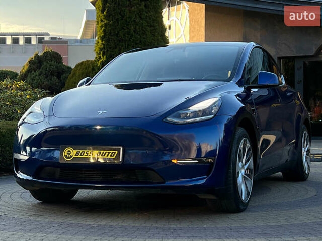 Синий Тесла Model Y, объемом двигателя 0 л и пробегом 72 тыс. км за 25750 $, фото 2 на Automoto.ua