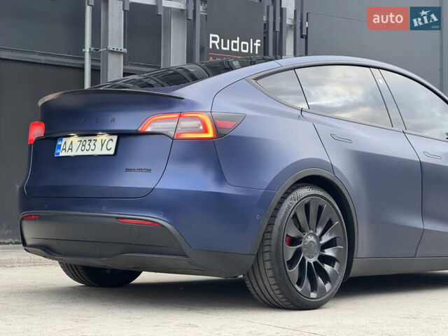 Синий Тесла Model Y, объемом двигателя 0 л и пробегом 88 тыс. км за 31990 $, фото 2 на Automoto.ua