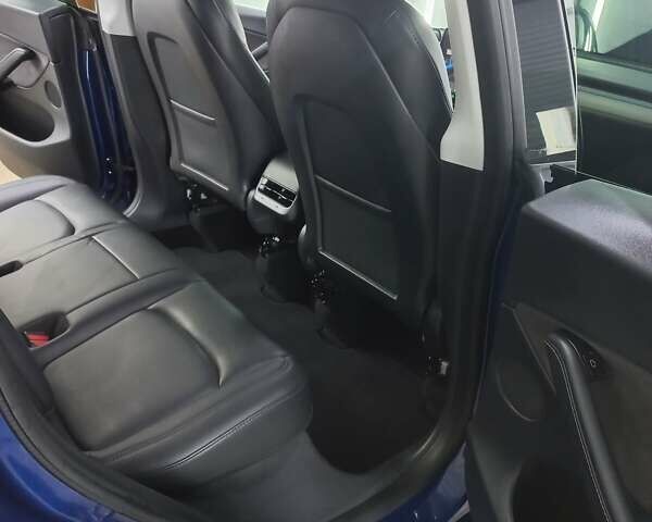 Синий Тесла Model Y, объемом двигателя 0 л и пробегом 91 тыс. км за 25850 $, фото 18 на Automoto.ua