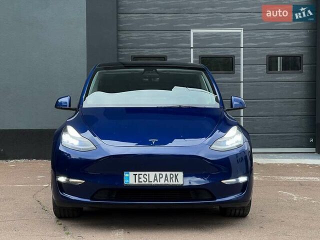 Синий Тесла Model Y, объемом двигателя 0 л и пробегом 66 тыс. км за 25500 $, фото 2 на Automoto.ua