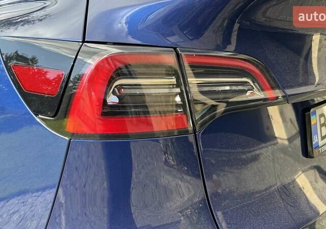 Синій Тесла Model Y, об'ємом двигуна 0 л та пробігом 66 тис. км за 28351 $, фото 34 на Automoto.ua