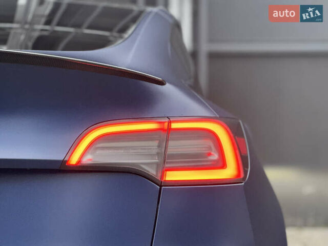 Синий Тесла Model Y, объемом двигателя 0 л и пробегом 88 тыс. км за 31990 $, фото 19 на Automoto.ua