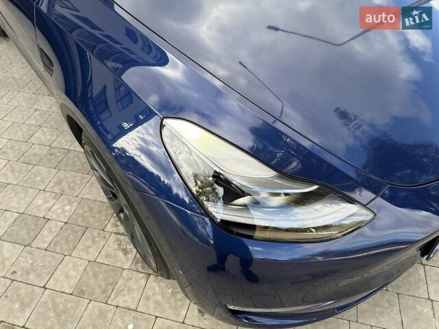 Синий Тесла Model Y, объемом двигателя 0 л и пробегом 87 тыс. км за 23999 $, фото 24 на Automoto.ua