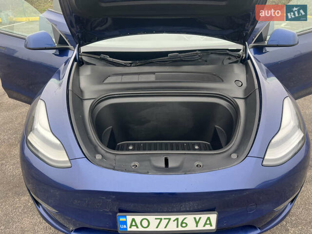 Синий Тесла Model Y, объемом двигателя 0 л и пробегом 125 тыс. км за 25997 $, фото 7 на Automoto.ua