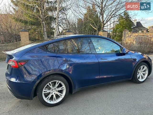 Синий Тесла Model Y, объемом двигателя 0 л и пробегом 62 тыс. км за 25800 $, фото 5 на Automoto.ua