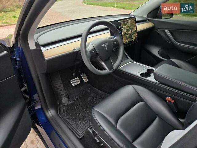 Синий Тесла Model Y, объемом двигателя 0 л и пробегом 99 тыс. км за 25500 $, фото 29 на Automoto.ua