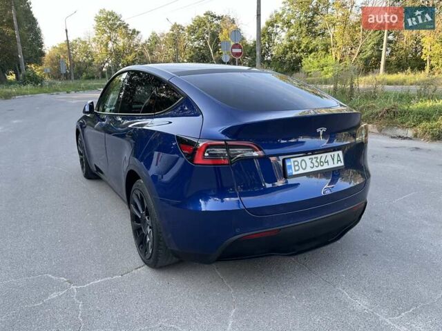 Синий Тесла Model Y, объемом двигателя 0 л и пробегом 68 тыс. км за 25000 $, фото 1 на Automoto.ua