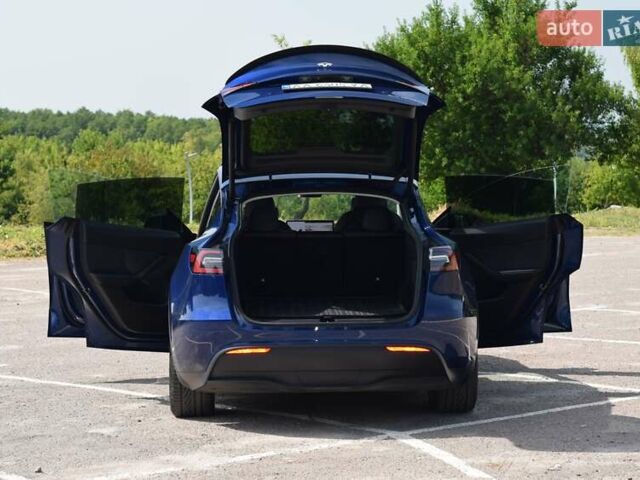 Синий Тесла Model Y, объемом двигателя 0 л и пробегом 81 тыс. км за 25499 $, фото 22 на Automoto.ua