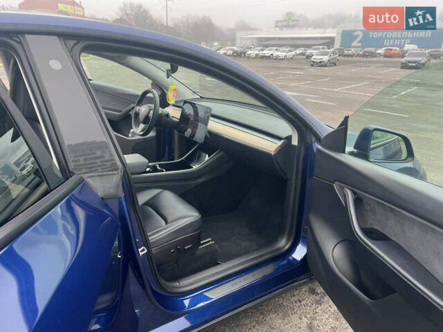 Синий Тесла Model Y, объемом двигателя 0 л и пробегом 125 тыс. км за 25997 $, фото 20 на Automoto.ua