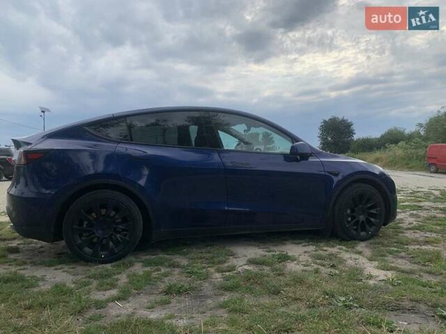 Синий Тесла Model Y, объемом двигателя 0 л и пробегом 75 тыс. км за 22900 $, фото 7 на Automoto.ua