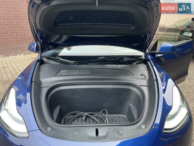 Синій Тесла Model Y, об'ємом двигуна 0 л та пробігом 76 тис. км за 24500 $, фото 26 на Automoto.ua
