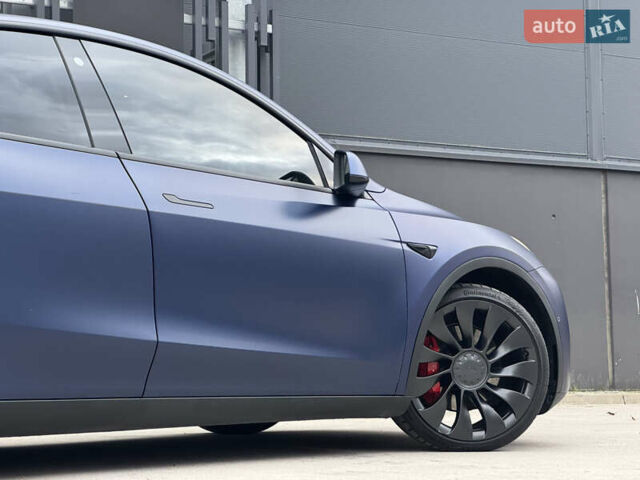 Синий Тесла Model Y, объемом двигателя 0 л и пробегом 88 тыс. км за 31990 $, фото 4 на Automoto.ua