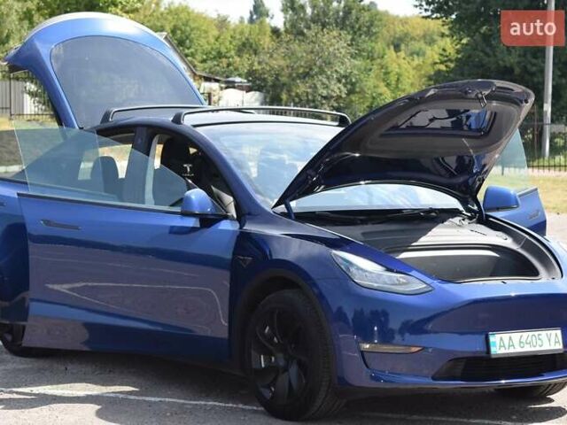 Синий Тесла Model Y, объемом двигателя 0 л и пробегом 81 тыс. км за 25499 $, фото 25 на Automoto.ua