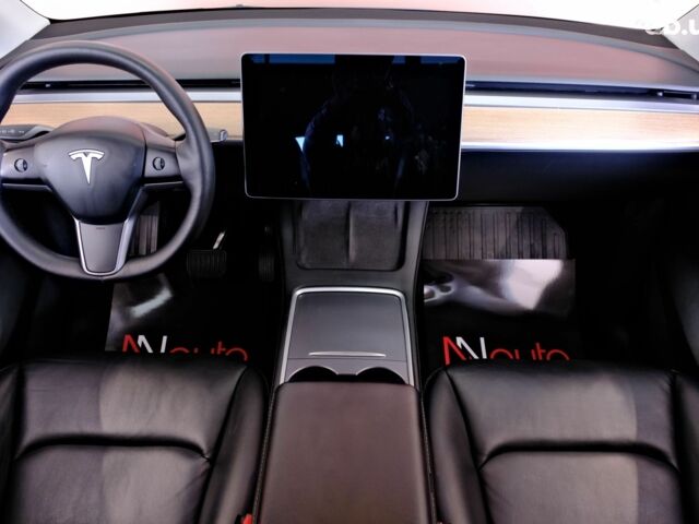 Синий Тесла Model Y, объемом двигателя 0 л и пробегом 76 тыс. км за 19900 $, фото 6 на Automoto.ua