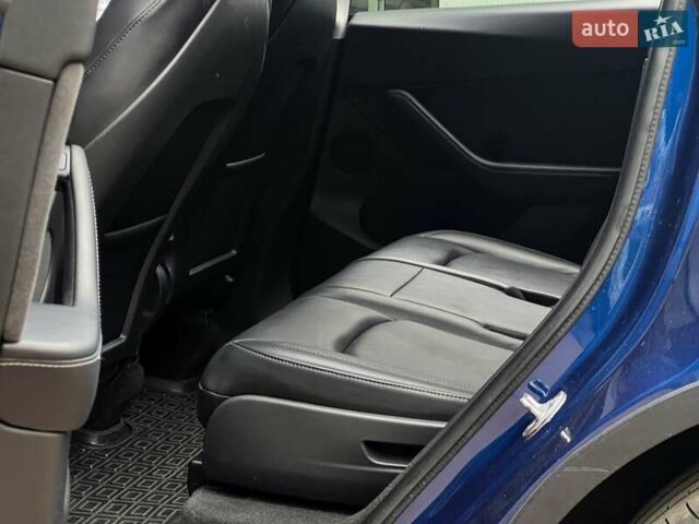 Синий Тесла Model Y, объемом двигателя 0 л и пробегом 66 тыс. км за 25500 $, фото 15 на Automoto.ua