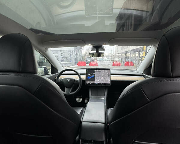Синий Тесла Model Y, объемом двигателя 0 л и пробегом 85 тыс. км за 24200 $, фото 10 на Automoto.ua