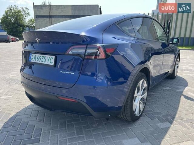 Синий Тесла Model Y, объемом двигателя 0 л и пробегом 61 тыс. км за 26500 $, фото 1 на Automoto.ua