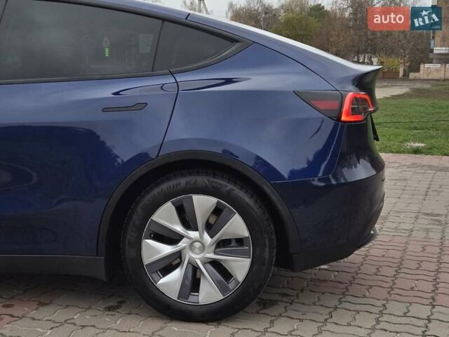 Синий Тесла Model Y, объемом двигателя 0 л и пробегом 99 тыс. км за 25500 $, фото 17 на Automoto.ua
