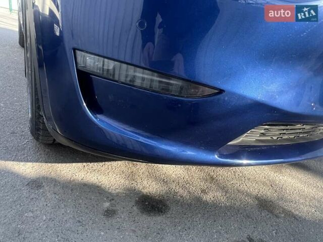 Синий Тесла Model Y, объемом двигателя 0 л и пробегом 101 тыс. км за 23999 $, фото 7 на Automoto.ua