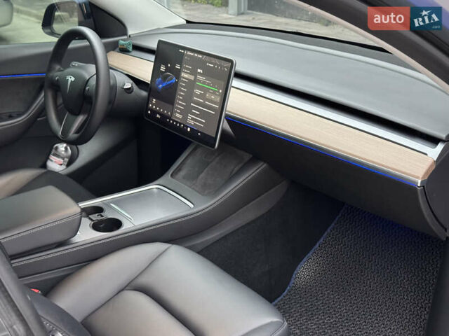 Синий Тесла Model Y, объемом двигателя 0 л и пробегом 88 тыс. км за 31990 $, фото 40 на Automoto.ua