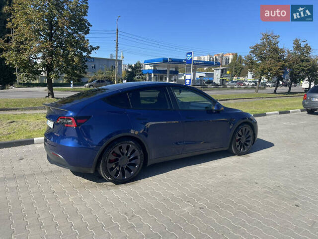 Синий Тесла Model Y, объемом двигателя 0 л и пробегом 127 тыс. км за 24700 $, фото 4 на Automoto.ua