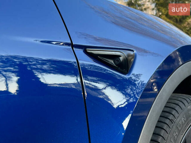 Синій Тесла Model Y, об'ємом двигуна 0 л та пробігом 64 тис. км за 26900 $, фото 20 на Automoto.ua