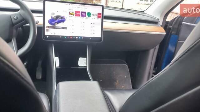 Синий Тесла Model Y, объемом двигателя 0 л и пробегом 74 тыс. км за 26500 $, фото 4 на Automoto.ua