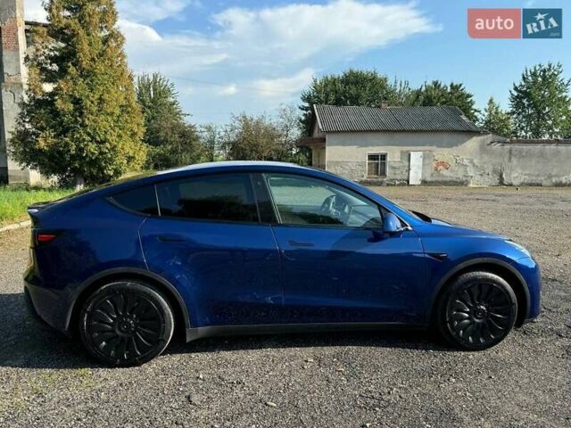 Синий Тесла Model Y, объемом двигателя 0 л и пробегом 72 тыс. км за 24800 $, фото 1 на Automoto.ua