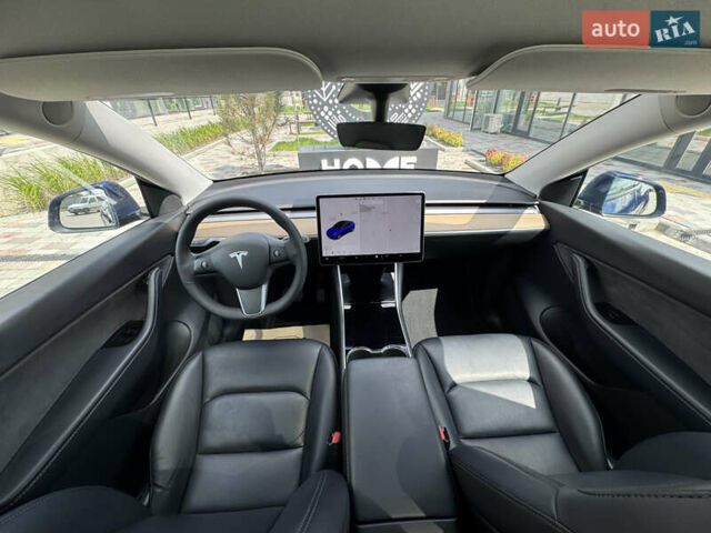 Синий Тесла Model Y, объемом двигателя 0 л и пробегом 83 тыс. км за 24999 $, фото 11 на Automoto.ua