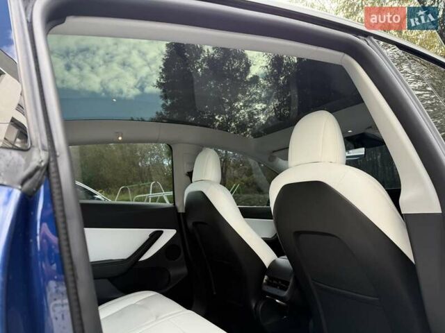 Синий Тесла Model Y, объемом двигателя 0 л и пробегом 86 тыс. км за 25900 $, фото 89 на Automoto.ua