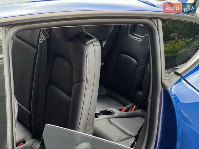 Синий Тесла Model Y, объемом двигателя 0 л и пробегом 66 тыс. км за 25500 $, фото 17 на Automoto.ua