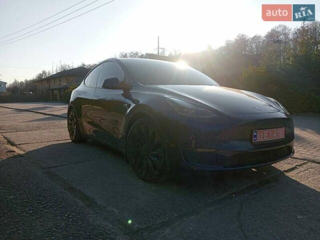 Синий Тесла Model Y, объемом двигателя 0 л и пробегом 115 тыс. км за 21900 $, фото 1 на Automoto.ua