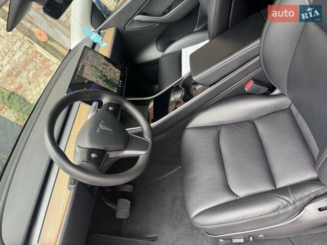 Синий Тесла Model Y, объемом двигателя 0 л и пробегом 145 тыс. км за 22000 $, фото 15 на Automoto.ua