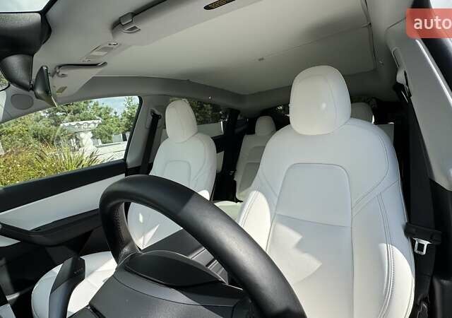 Синій Тесла Model Y, об'ємом двигуна 0 л та пробігом 66 тис. км за 28351 $, фото 14 на Automoto.ua