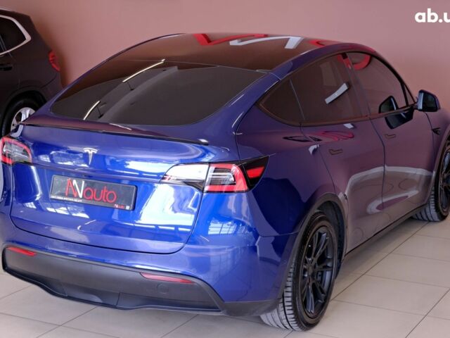 Синий Тесла Model Y, объемом двигателя 0 л и пробегом 76 тыс. км за 19900 $, фото 4 на Automoto.ua