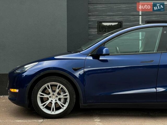 Синий Тесла Model Y, объемом двигателя 0 л и пробегом 66 тыс. км за 25500 $, фото 4 на Automoto.ua