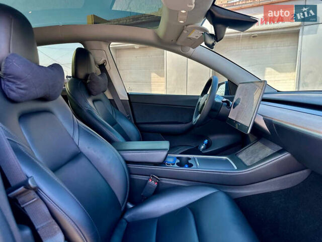 Синий Тесла Model Y, объемом двигателя 0 л и пробегом 33 тыс. км за 23300 $, фото 34 на Automoto.ua