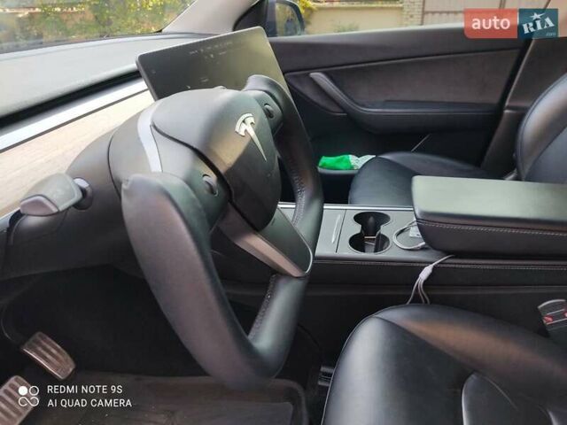 Синий Тесла Model Y, объемом двигателя 0 л и пробегом 58 тыс. км за 24000 $, фото 10 на Automoto.ua